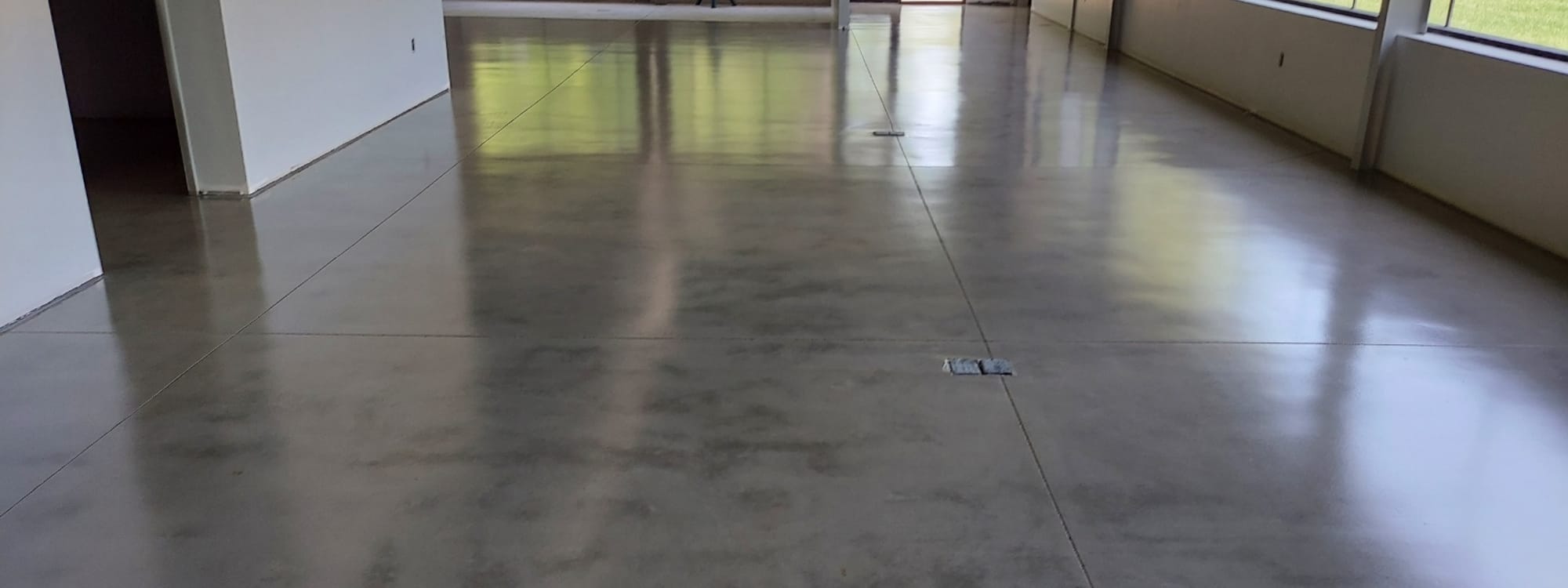 Polished commercial floor by All Out Coatings