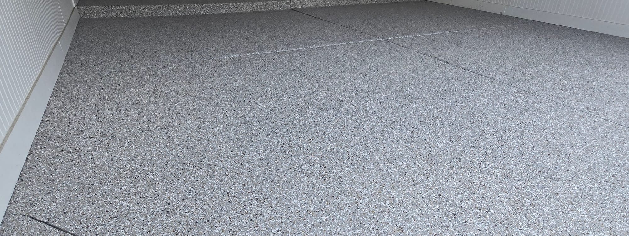 Epoxy flake floor color by All Out Coatings