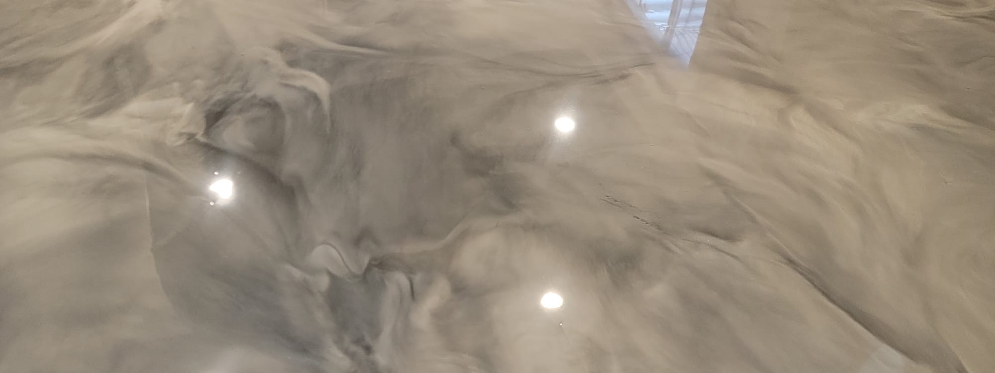 Metallic epoxy floor by All Out Coatings