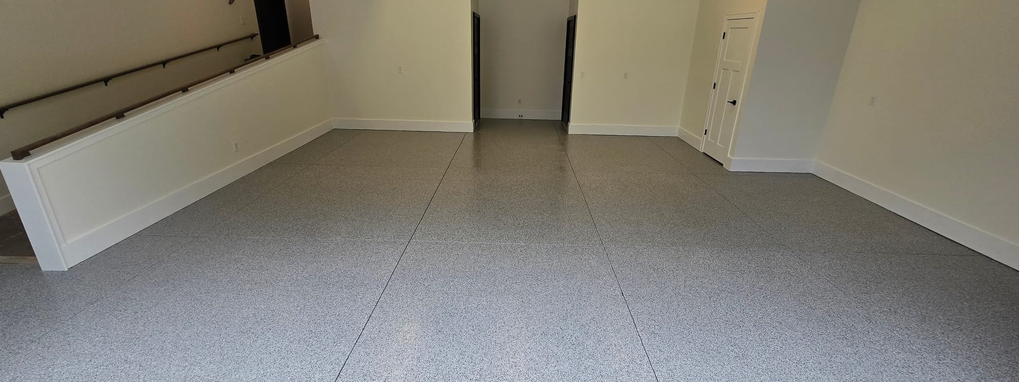 Finished epoxy flake floor by All Out Coatings